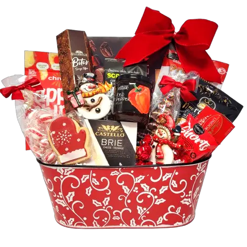 A wonderful surprise to receive, this beautiful gift basket is overflowing with so many scrumptious sweet and gourmet treats to enjoy. There's chocolate and cookies, pepperoni snacks, cheese topper jelly, cheese & crackers, Chiwi's chips, candies and pretzels along with a special touch of a couple keepsake ornaments to treasure.