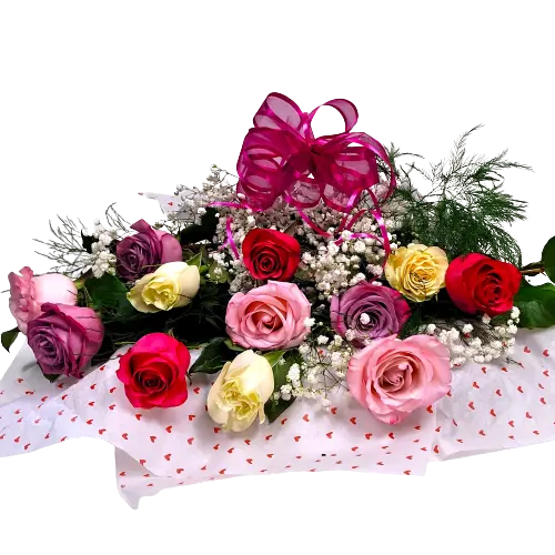 A dozen roses in soft pastel colours.