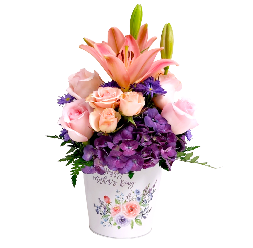 Happy Mother's Day tin filled with a lush arrangement of flowers.