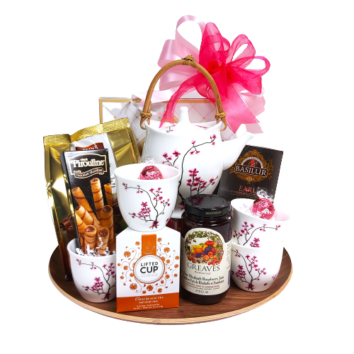 For the tea lover, this one is sure to be a hit with the beautiful pink blossom tea set nestled amongst an assortment of biscuits, chocolates and jam all beautifully arranged on a pretty wooden tray.
