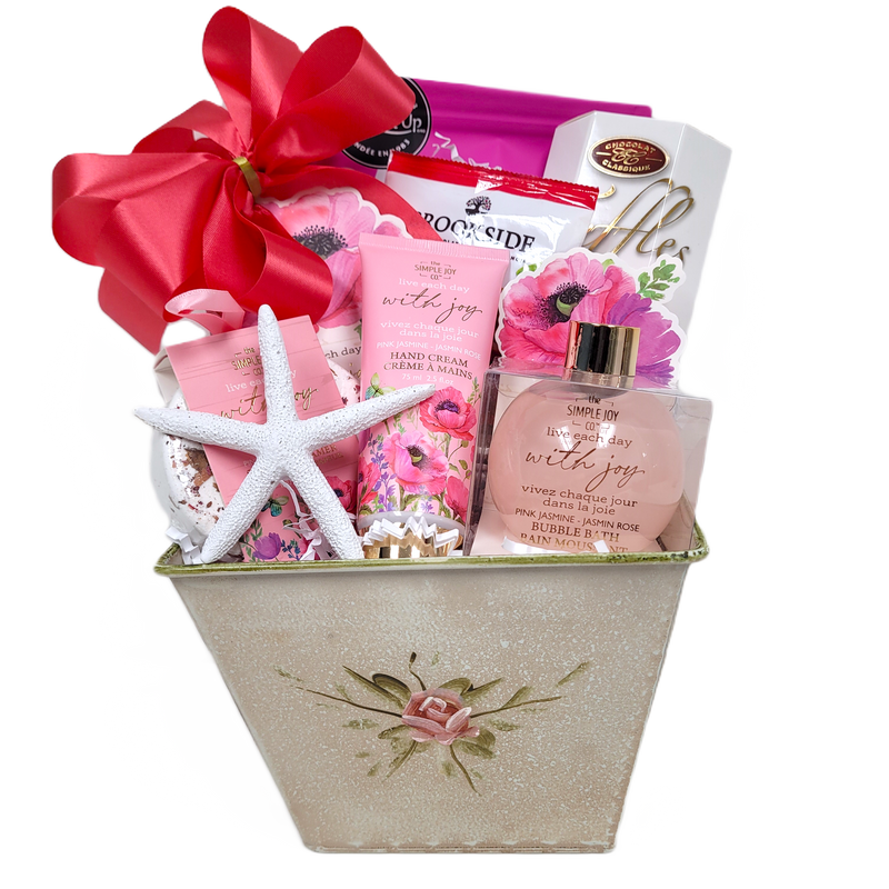 Your Mom will delight in this rose tin filled with lots of pampering and scrumptious sweets to enjoy. There's a softly scented shower steamer, bath salts, hand lotion and bubble bath nestled amongst some yummy biscuits, truffles and chocolate treats.