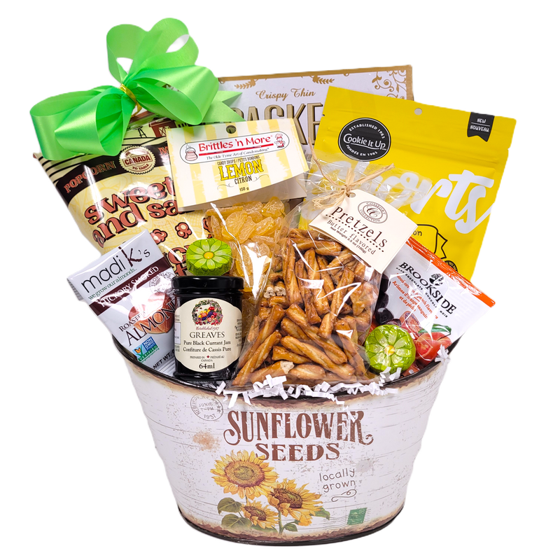 Nestled in our pretty sunflower tin is a wonderful assortment of sweet treats to enjoy. There's shortbread, chocolates, crackers, candies, sweet jam and more to delight in.