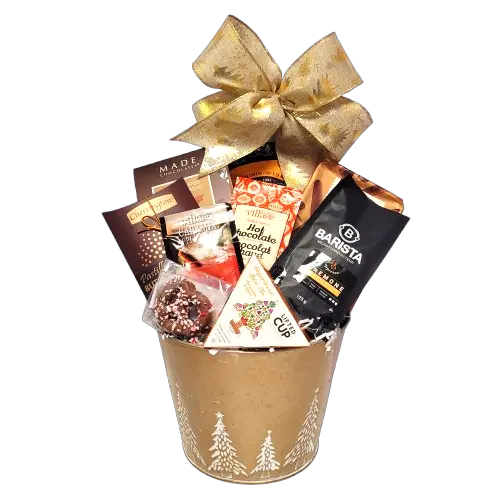 A holiday gift basket with hot chocolate, tea or coffee with different sweet treats.