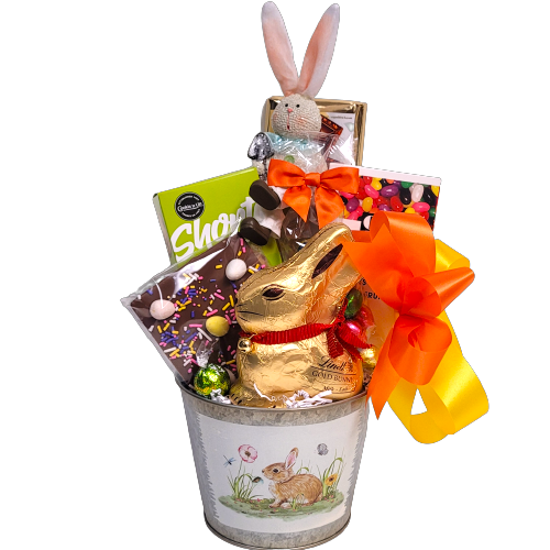 Our classic "bunny in the garden" tin pot holds a chocolate bunny, delectable shortbread, Easter chocolate bark, jelly beans, chocolate Easter eggs and a cute bunny to sit on the mantle!