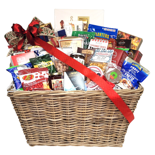 A basket filled with sweet and salty treats, gourmet sauces & condiments, tea, coffee, pepperoni and much more!