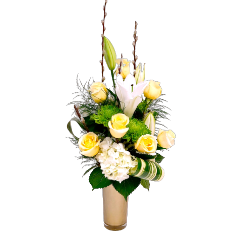 White lilies, hydrangea, premium roses and green foliage.