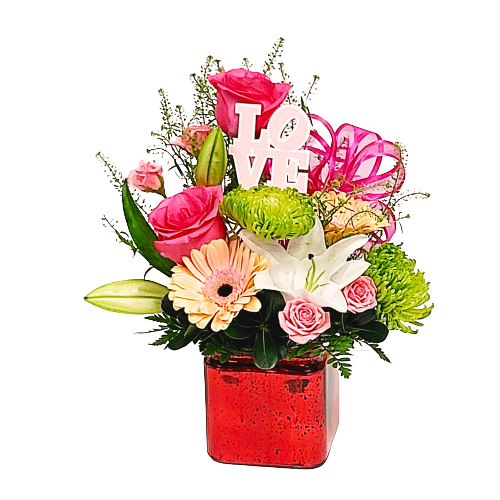 Your love will bloom with this pretty cube arrangement of soft coloured florals.