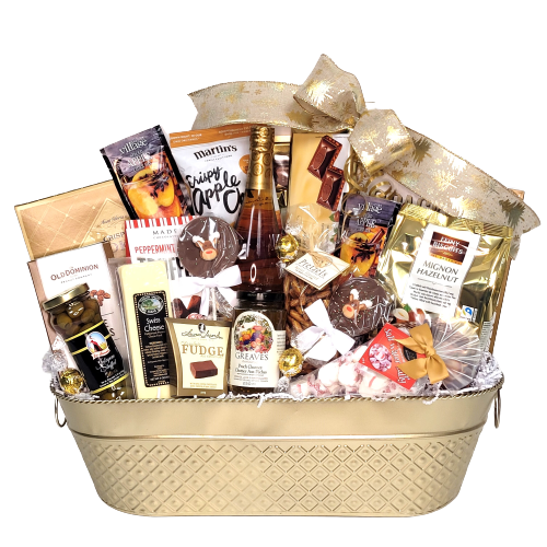 An oversized golden tin with sparkling apple cider, crackers, cheese, olives, nuts, chocolate lollies, chutney and more.