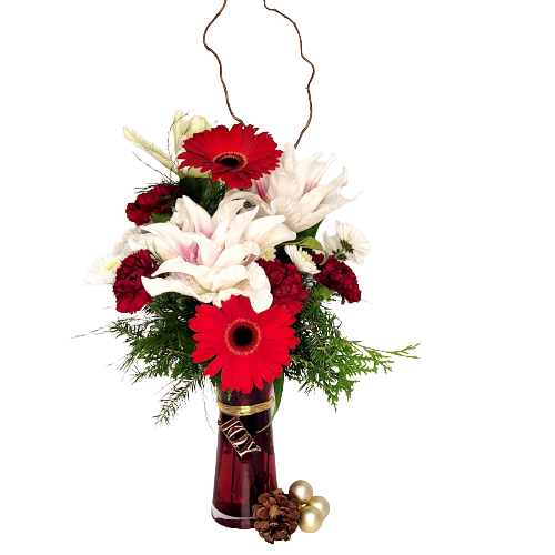 A red vase filled with florals and Christmas greens.