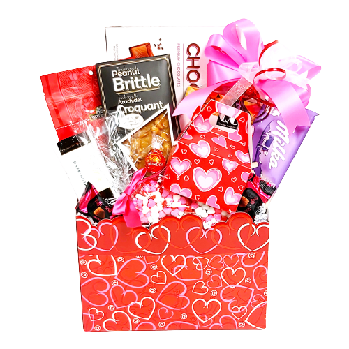 A gift basket with chocolate-covered pretzels, peanut brittle, chocolates, cookies and candies too!