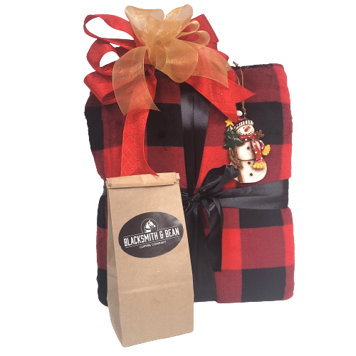 Send a warm snuggle with this soft fleece blanket, coffee and an ornament to keep.