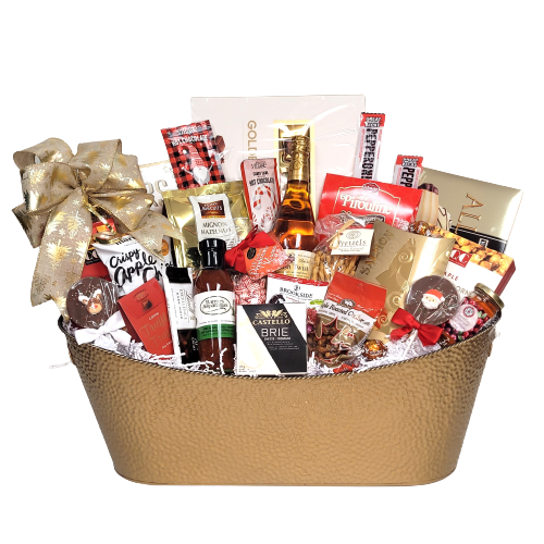 A large gold tin filled with sparkling apple cider, chocolate, crackers, cheese, cookies, pretzels, jam, pepperoni, salmon and many more gourmet delectables.