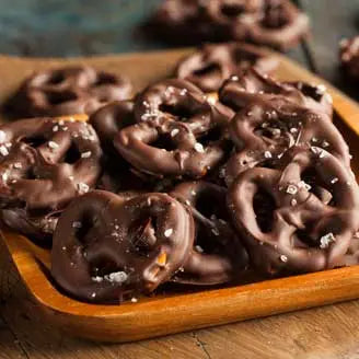 Sweet and salty chocolate bark with a cup of coffee.