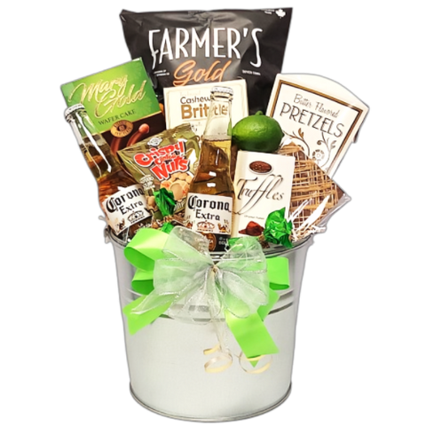 A bucket of beer and sweet and salty snacks, including pretzels, nuts, chocolate, brittle and more.