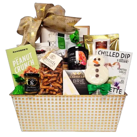A gift basket with a cheese topper for the cheese and crackers, mustard for dipping the pretzels in, truffles, dip mix, cookies, chocolates and more.