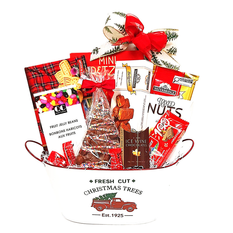 Our nostalgic Christmas tin is brimming with a wonderful assortment of delectable munchies. There's shortbread, pretzels, fruit jelly beans, Ice Wine chocolates, wafers, nuts, a chocolate Christmas tree and more. A wonderful assortment of treats to indulge in.