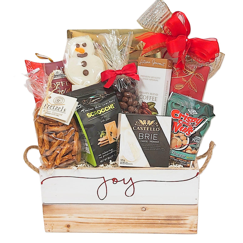 Our festive wood crate gif t basket imprinted with "Joy" filled to the brim with cookies, truffles, crackers, cheese, nuts, coffee, pretzels and more.
