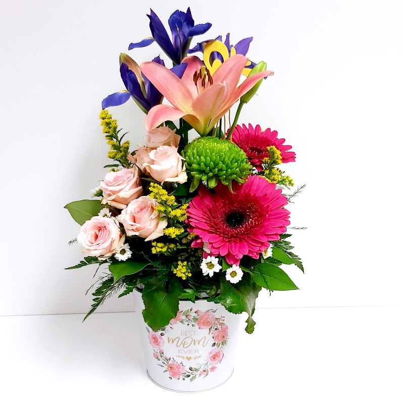 When your Mom is the best, she deserves a beautiful flower arrangement of lush pinks, purples and greens all beautifully arranged in our "Best Mom Ever" tin pot! 