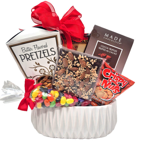 A ceramic planter to keep and lots of treats to eat.  There's shortbread, pretzels, truffles, chocolate bark, crispy nuts and jelly beans.