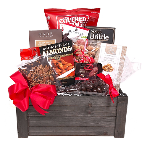 Wood crate with chocolate treats, a variety of nuts, chips, wafers and more! 