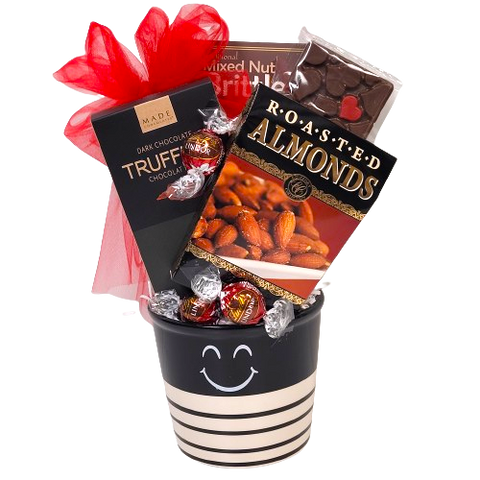 Send a smile with this cute ceramic pot loaded with truffles, peanut brittle, chocolate and nuts. Will sure bring on a smile no matter the occasion!