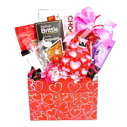 Beautifully designed Valentine's box of treats with peanut brittle, chocolates, cookies, candies and chocolate covered pretzels too.
