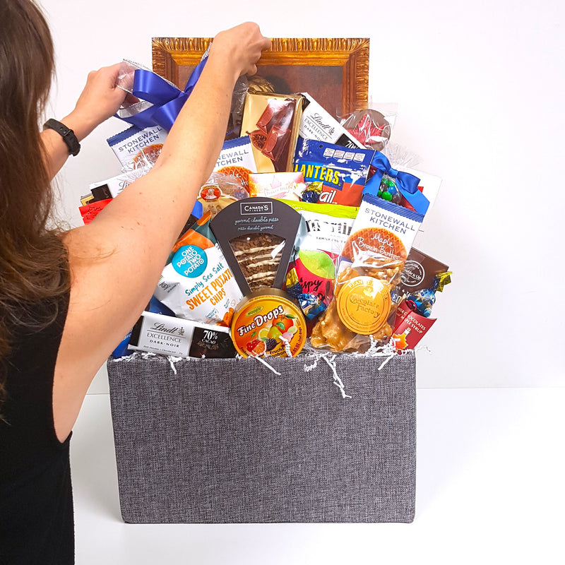 Designer's Choice gift basket filled with loads of sweet and salty snacks to enjoy!