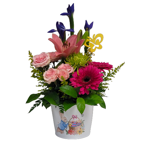 Our pretty Peter Cottontail tin pot is filled with gerbera daisies, irises, lillies and spray roses too! Sure to bring some Easter cheer!