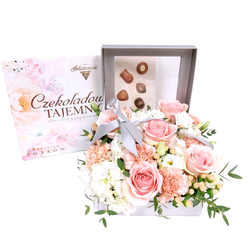 Beautiful floral arrangement in our silver designer box with soft pastels of roses, hydrangea, lisianthus, carnations with a delectable box of chocolates to enjoy.