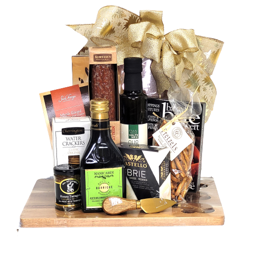This beautiful cheese board and knife set is loaded with lots of gourmet delights. There's artisanal salami, oil, vinegar, cheese, mustard, salmon, chocolate and more. Great for special occasion entertaining!