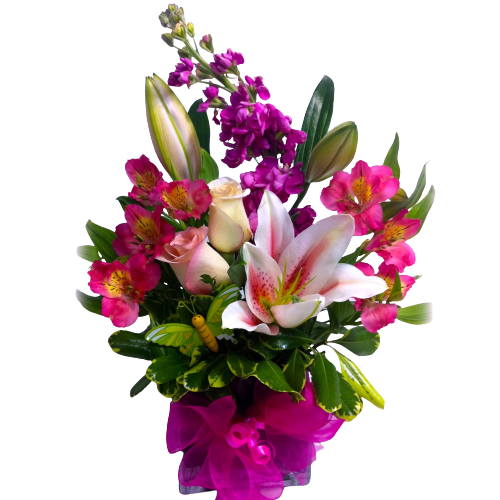 Our pretty in pink vase arrangement is a luscious assortment of alstromeria, roses, lilies and stock florals all in hues of pinks, whites and creams.